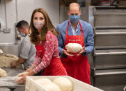 <p>Kate Middleton and Prince William help out by kneading dough during their visit to Beigel Bake Brick Lane Bakery, which was forced to reduce their opening hours during the pandemic, on Tuesday in London.</p>