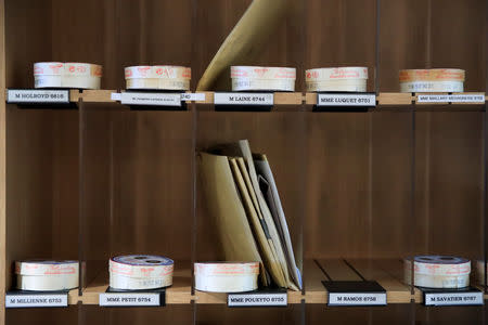 Boxes of a non-pasteurized French Camembert cheese are seen on the mailbox at the National Assembly in Paris, France, March 13, 2019. REUTERS/Gonzalo Fuentes