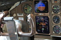 Honeywell test pilot Joe Duval pulls a Boeing 757 test aircraft out of a landing approach demonstrating runway hazard warning systems at the airport in Tyler, Texas, Tuesday, June 4, 2024. (AP Photo/LM Otero)