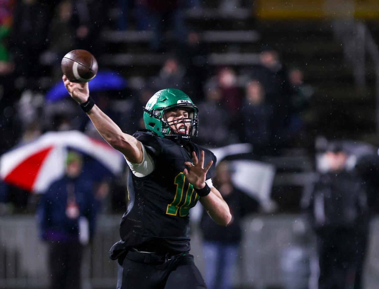 West Linn's Sam Leavitt (10) throws a pass during the 6A OSAA State Championship game against Sheldon on Friday, Nov. 25, 2022 at Hillsboro Stadium in Hillsboro, Ore. 