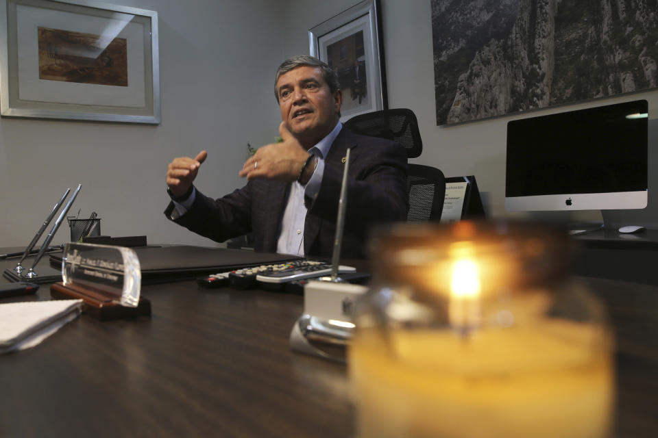 In this July 19, 2019 photo, government secretary Manuel Gonzalez of Nuevo Leon state speaks to the Associated Press at his office in Monterrey, Mexico. Gonzalez vowed that the state of Nuevo Leon protects migrants' rights. (AP Photo/Marco Ugarte)