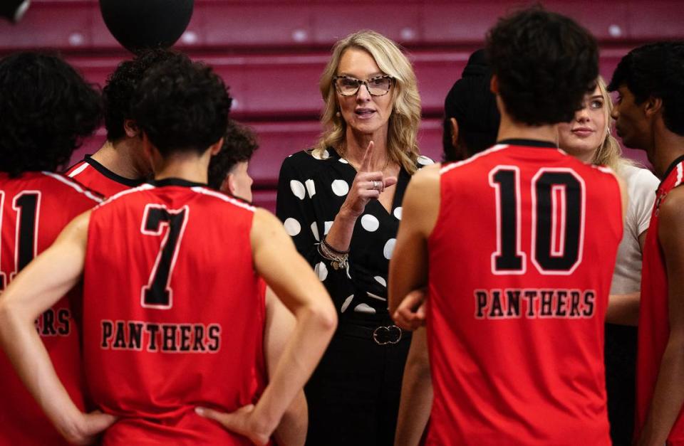 Modesto head coach Traci Mulder talks to her players during a timeout in the Central California Athletic League match with Pitman in Modesto, Calif., Thursday, April 27, 2023.