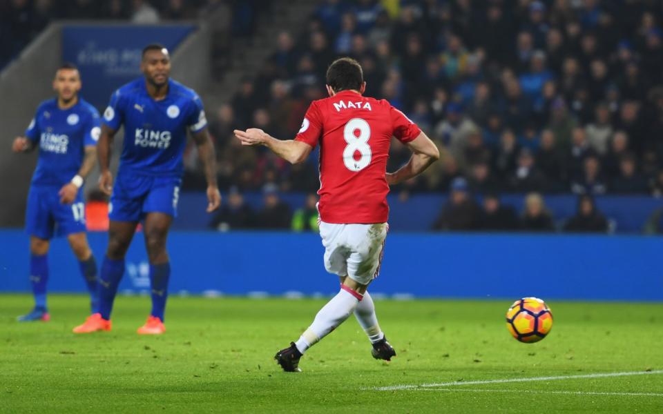 <p>Juan Mata of Manchester United scores their third goal goal during the Premier League match between Leicester City and Manchester United at The King Power Stadium on February 5, 2017 in Leicester, England. </p>