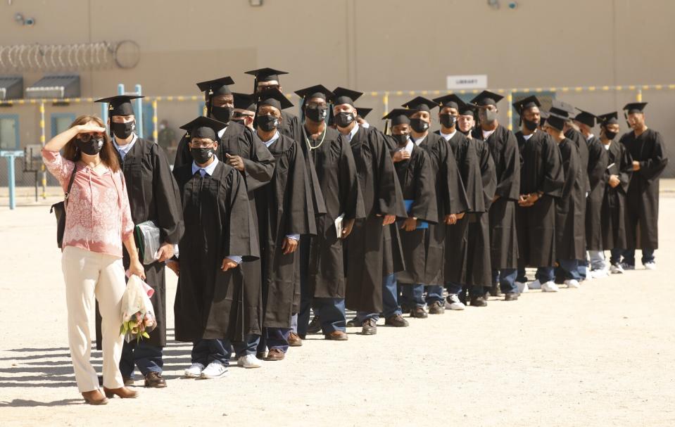 Taffany Lim leads a line of graduates of Cal State L.A.'s Prison B.A. Program