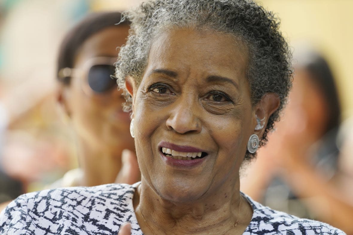 Myrlie Evers, civil right leader and widow of slain civil rights icon Medgar Evers, acknowledges the audience applause after the unveiling of the new park sign for Medgar and Myrlie Evers Home National Monument in Jackson, Miss., Thursday, June 8, 2023.(AP Photo/Rogelio V. Solis)