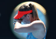 Tennis - Australian Open - Fourth Round - Melbourne Park, Melbourne, Australia, January 20, 2019. Russia's Maria Sharapova reacts during the match against Australia's Ashleigh Barty. REUTERS/Lucy Nicholson