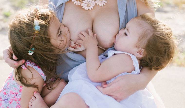 This Mother Did a Photoshoot Breastfeeding Her 2 Daughters and the Images Are Beautiful