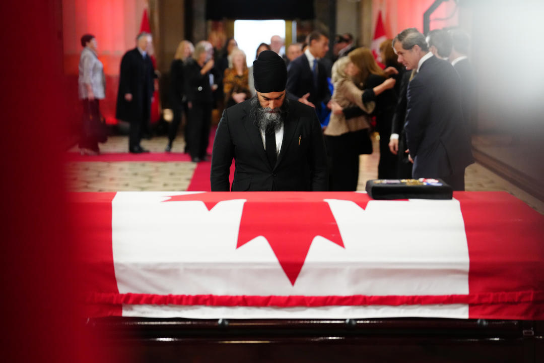 NDP Leader Jagmeet Singh pays his respects at the casket of former prime minister Brian Mulroney as he lies in state at the Sir John A. Macdonald building opposite Parliament Hill in Ottawa on Tuesday, March 19, 2024. THE CANADIAN PRESS/Sean Kilpatrick