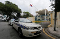 Police cars block the entrance of a sealed off North Korea embassy in Kuala Lumpur, Malaysia March 7, 2017. REUTERS/Lai Seng Sin