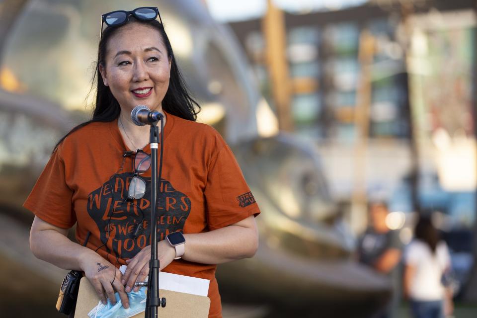 Leezah Sun, the founder of Strength in Unity, speaks at a rally in support of the Valley's Asian American and Pacific Islander communities that she helped organize at Margaret T. Hance Park in Phoenix on April 24, 2021. Organizers of the rally memorialized the victims of recent mass shootings in Indiana and Atlanta as well as people killed in police shootings around the country.