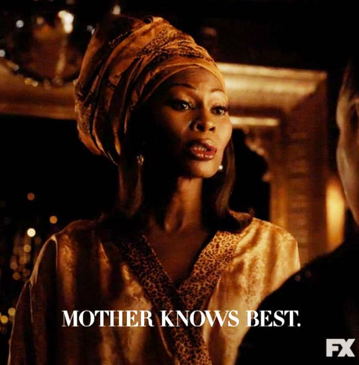 Character from a show wearing a head wrap and patterned robe with text "MOTHER KNOWS BEST."