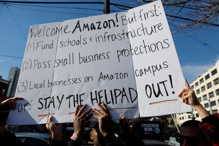 FILE PHOTO: Demonstrators gather to protest Amazon's new location workplace in Long Island City of the Queens borough of New York, U.S., November 14, 2018. REUTERS/Shannon Stapleton/File Photo