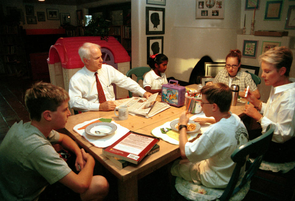 <p>Presidential candidate John McCain with wife Cindy in their home in Phoenix, Ariz., with their children. The oldest daughter is Meghan, their adopted daughter is Bridgette, and their two sons, Jack and Jimmy, October 14, 1999. (Photo: Karin Cooper/Hulton Archive via Getty Images) </p>