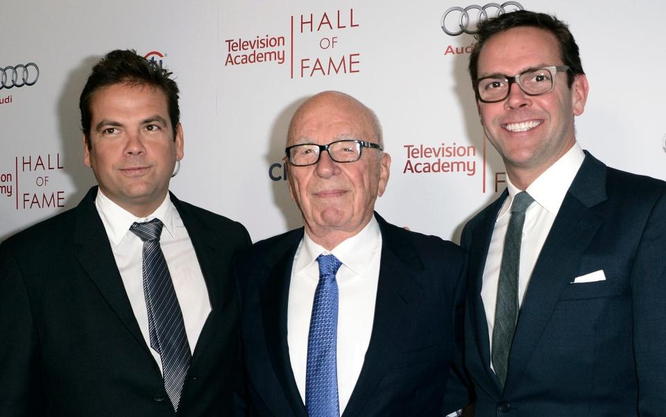 Rupert Murdoch, pictured with sons Lachlan and James, has agreed to sell a vast swathe of his media empire for $66bn (£49.1bn)