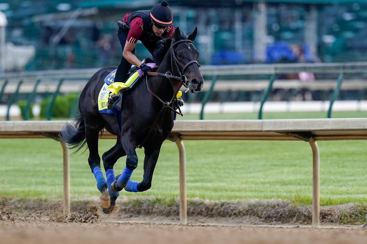 <p>Kentucky Derby winner Medina Spirit, a horse trained by Bob Baffert, runs on the track at Churchill Downs in Louisville, Kentucky, US on 28 April, 2021</p> (Reuters)