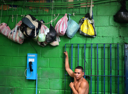 A prisoner stands in Puerto Cortes jail, Honduras, July 31, 2018. REUTERS/Goran Tomasevic