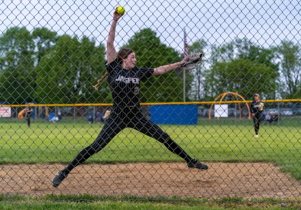 Jasper’s Elise Lampert (21) warms up as the Jasper Wildcats play the Memorial Tigers in Evansville, Ind., Tuesday, April 23, 2024.