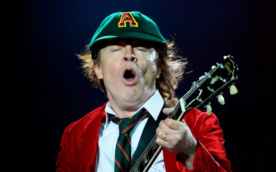 Pedal-to-the-metal maximum rock and roll: Angus Young  - Patricia de Melo Moreira