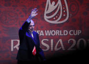 FILE - In this Friday Dec. 1, 2017 file photo former English soccer international Gordon Banks waves as he walks on stage for the 2018 soccer World Cup draw in the Kremlin in Moscow. English soccer club Stoke said Tuesday Feb. 12, 2019 that World Cup-winning England goalkeeper Gordon Banks has died at 81. (AP Photo/Pavel Golovkin, File)