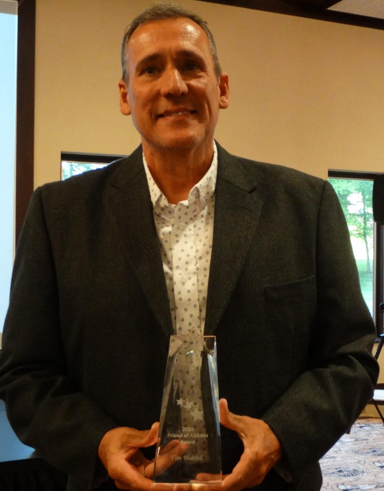 Tim Hubbell, outreach specialist at Lutheran Social Services, received the Friends of ADAMH at its annual awards dinner.