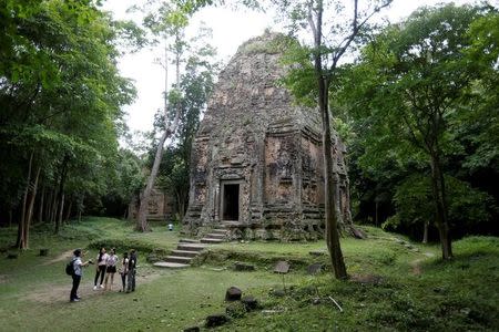 Tourists visit Sambor Prei Kuk, or "the temple in the richness of the forest", an archaeological site of ancient Ishanapura, is seen after being listed as a UNESCO world heritage site, in Kampong Thom province, Cambodia July 15, 2017. Picture taken July 15, 2017. REUTERS/Samrang Pring