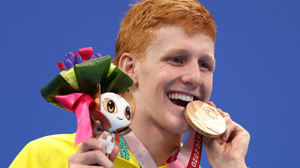 Col Pearse of Team Australia celebrates with the bronze medal during the medal ceremony for the Men's 100m Butterfly - S10 Final on day 7 of the Tokyo 2020 Paralympic Games. (Photo by Lintao Zhang/Getty Images)