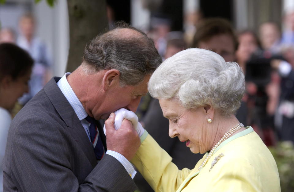 LONDON, UNITED KINGDOM - MAY 20:  Prince Charles Kissing The Hand Of His Mother Queen Elizabeth When They Met At The Chelsea Flower Show.  (Photo by Tim Graham Photo Library via Getty Images)