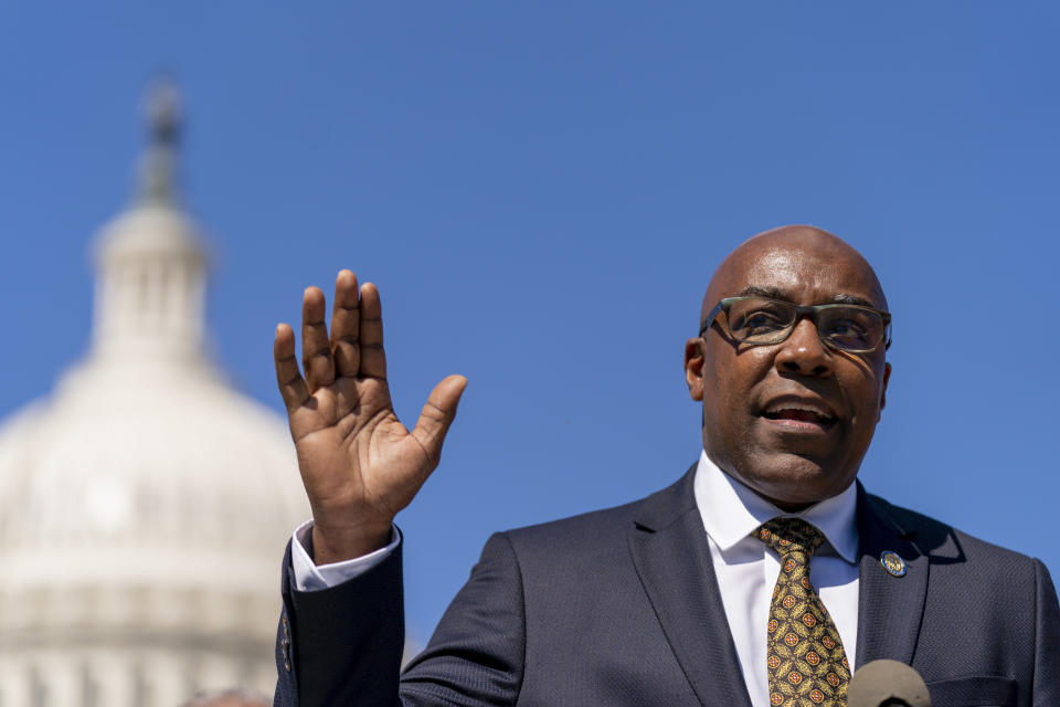 FILE - Illinois Attorney General Kwame Raoul speaks at a rally to call on the National Archivist to publish the Equal Rights Amendment as an amendment in the Constitution, on Capitol Hill in Washington, Sept. 28, 2022. Critics of a law that takes effect Sunday, Jan. 1, 2023, to eliminate cash bail in Illinois criminal courts fear that a judge's ruling that the plan is unconstitutional will create a chaotic, two-tiered system of pretrial release unless urgent action is taken. (AP Photo/Andrew Harnik, File)