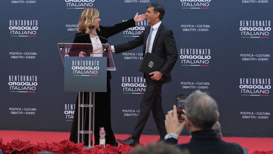 Italy's Prime Minister, Giorgia Meloni, also welcomed British Prime Minister Rishi Sunak on stage during the Atreju political meeting organized by the young militants of Italian right wing party Brothers of Italy. - Andreas Solaro/AFP/Getty Images