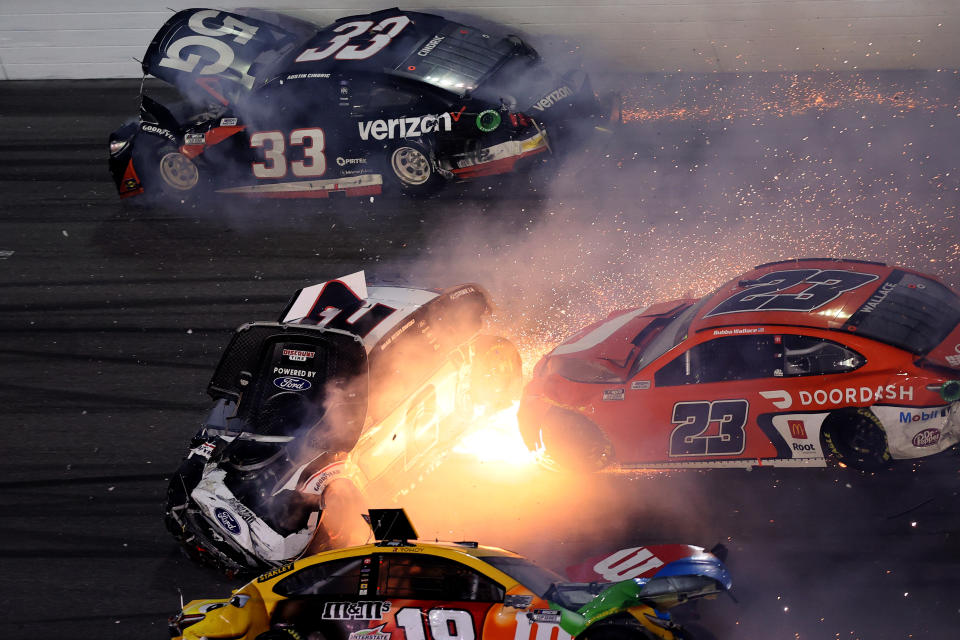 Bubba Wallace (23) sees his night end just short of the finish of the Daytona 500. (Photo by James Gilbert/Getty Images)