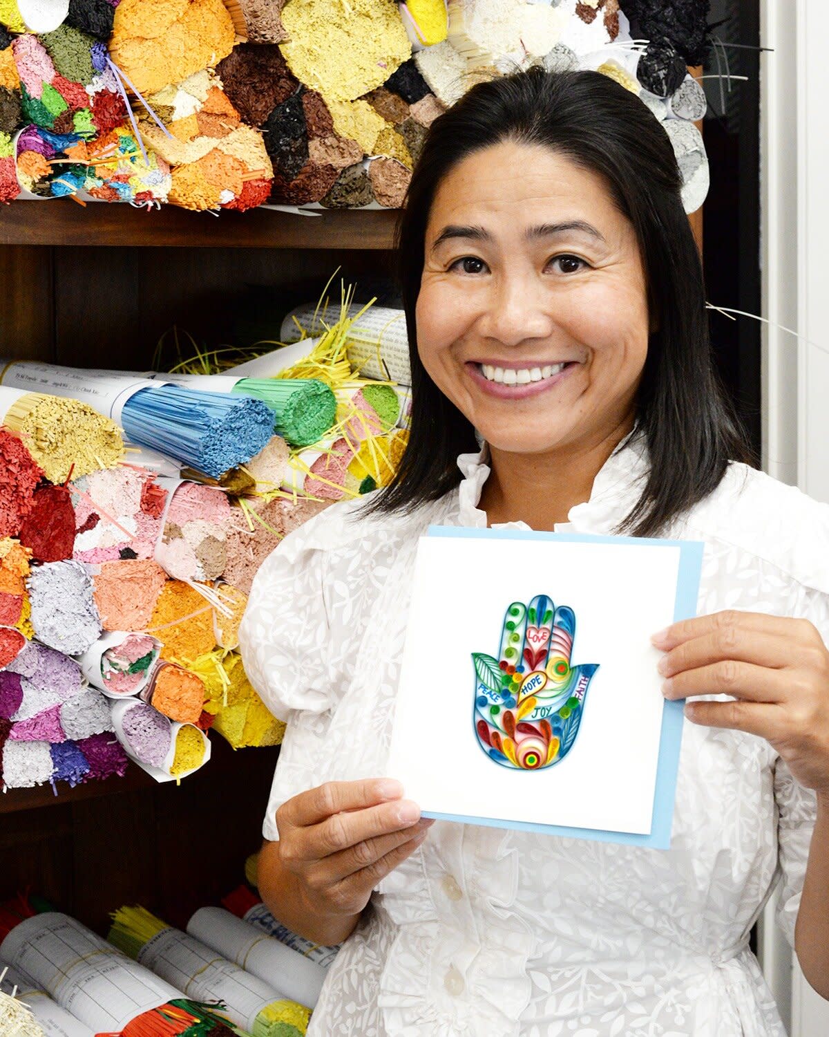 huong wolf holding quilling card