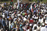 Sudanese protesters take part in a rally demanding the dissolution of the transitional government, outside the presidential palace in Khartoum, Sudan, Saturday, Oct. 16, 2021. (AP Photo/Marwan Ali)