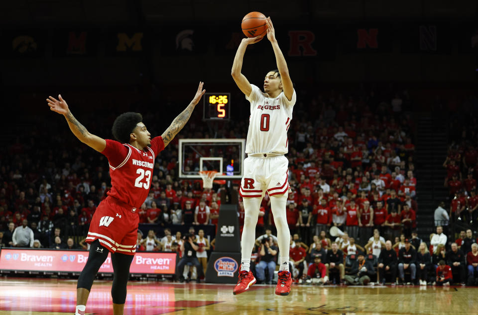 Rutgers guard Derek Simpson (0) shoots over Wisconsin guard Chucky Hepburn (23) during the second half of an NCAA college basketball game, Saturday, Feb. 10, 2024, in Piscataway, N.J. The Rutgers won 78-56. (AP Photo/Noah K. Murray)