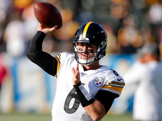 <p>Katharine Lotze/Getty</p> Devlin Hodges warming up before his first career NFL start with the Pittsburgh Steelers in 2019.