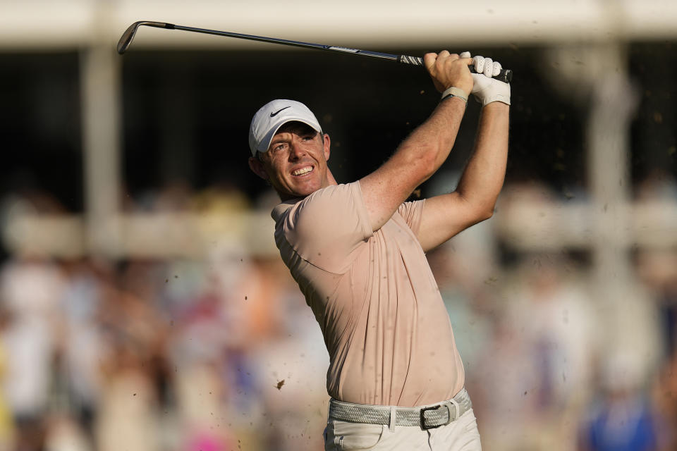 Rory McIlroy follows his shot on the 18th hole during the final round of the St. Jude Championship golf tournament Sunday, Aug. 13, 2023, in Memphis, Tenn. (AP Photo/George Walker IV)