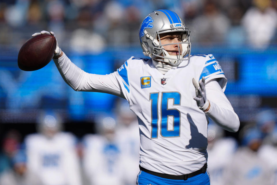 Detroit Lions quarterback Jared Goff passes during the first half of an NFL football game between the Carolina Panthers and the Detroit Lions on Saturday, Dec. 24, 2022, in Charlotte, N.C. (AP Photo/Jacob Kupferman)