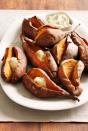 <p>While technically not a sweet potato, these maple-ginger butter yams will go over just as well (if not better) with sweet potato lovers.</p><p><a href="https://www.womansday.com/food-recipes/food-drinks/recipes/a33133/roasted-yams-maple-ginger-butter-recipe-rbk1110/" rel="nofollow noopener" target="_blank" data-ylk="slk:Get the recipe for Roasted Yams with Maple-Ginger Butter.;elm:context_link;itc:0;sec:content-canvas" class="link "><em>Get the recipe for Roasted Yams with Maple-Ginger Butter.</em></a></p>