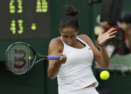 Madison Keys returns a ball to Elizaveta Kulichkova of Russia. (AP)