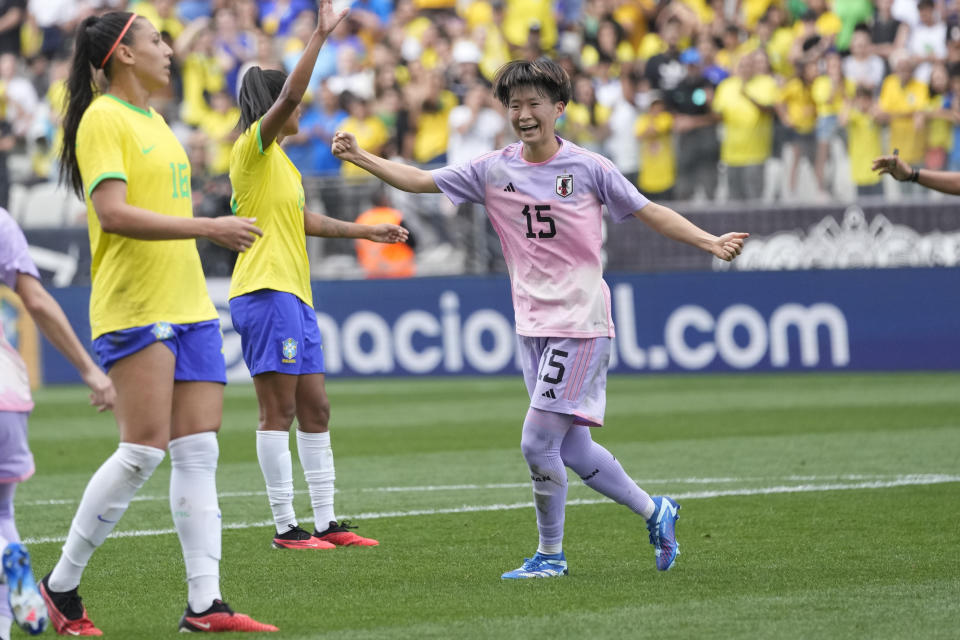 Japan's Aoba Fujino celebrates after scoring her side's opening goal against Brazil during a women's friendly soccer match at the Neo Quimica Arena in Sao Paulo, Brazil, Thursday, Nov. 30, 2023. (AP Photo/Andre Penner)