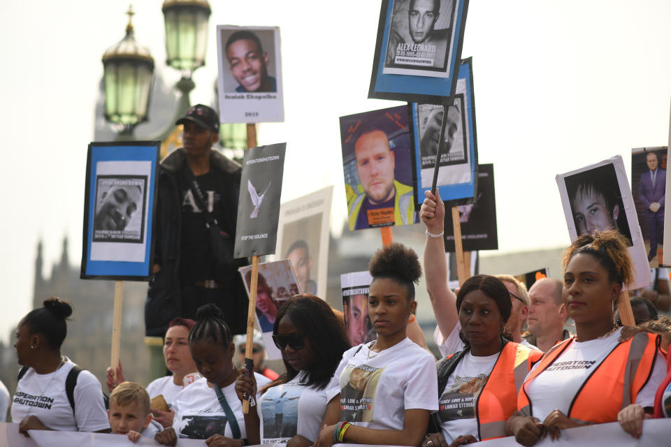 Anti-knife crime campaigners on Westminster Bridge in central London, calling for action over recent bloodshed.