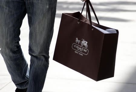 A shopping bag from the luxury brand Coach is seen along Rodeo Drive in Beverly Hills, California, May 21, 2013. REUTERS/Fred Prouser