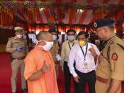Chief Minister of Uttar Pradesh state Yogi Adityanath inspects the site for a groundbreaking ceremony of a temple dedicated to the Hindu god Ram in Ayodhya, India, Wednesday, Aug. 5, 2020. The coronavirus is restricting a large crowd, but Hindus were joyful before Prime Minister Narendra Modi breaks ground Wednesday on a long-awaited temple of their most revered god Ram at the site of a demolished 16th century mosque in northern India. (AP Photo/Rajesh Kumar Singh)