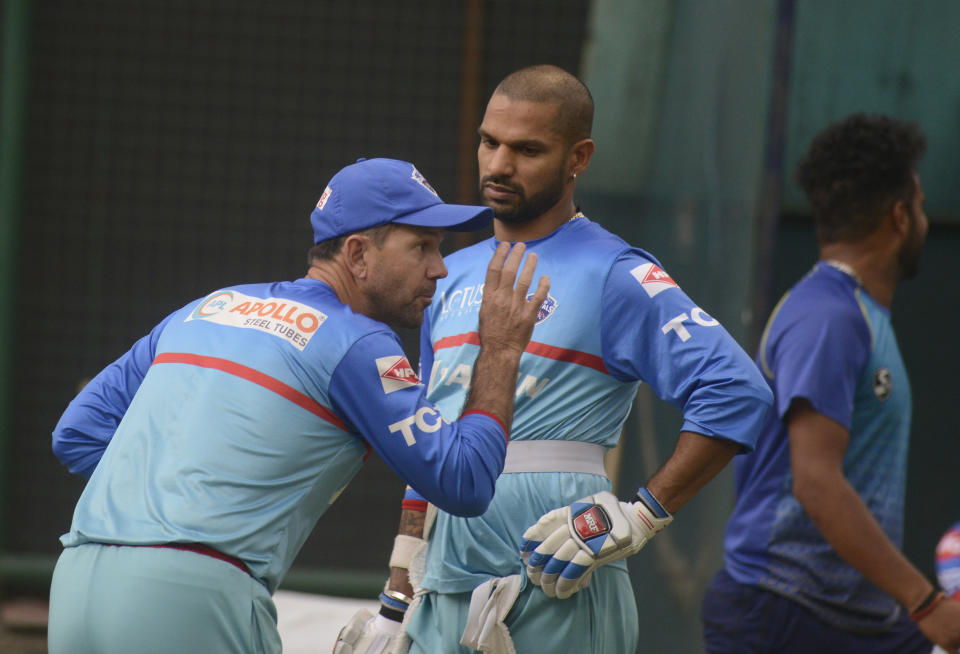 Shikhar Dhawan and Ricky Ponting talking during a training session for the Mumbai Indians.