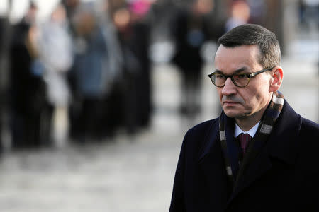 Polish Prime Minister Mateusz Morawiecki attends a commemoration event at the former Nazi German concentration and extermination camp Auschwitz II-Birkenau, during the ceremonies marking the 74th anniversary of the liberation of the camp and International Holocaust Victims Remembrance Day, near Oswiecim, Poland, January 27, 2019. Agencja Gazeta/Jakub Porzycki via REUTERS