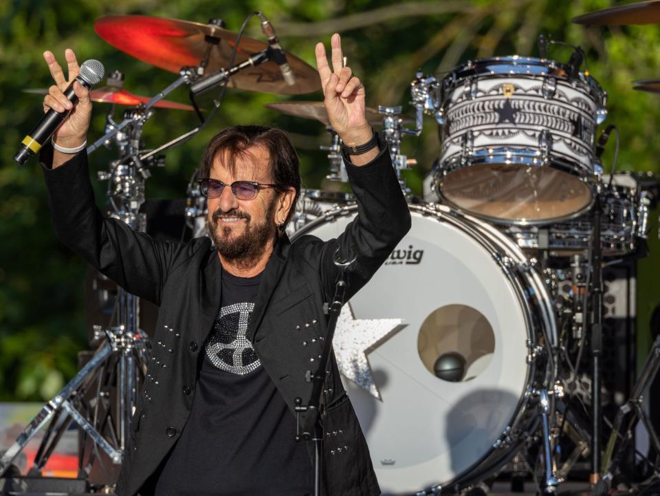 Ringo Starr sends peace and love to the Cuthbert Amphitheater crowd after singing the Beatles tune "What Goes On" with his All Starr Band in Eugene on June 2, 2023.