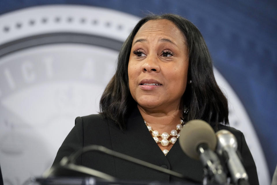 FILE - Fulton County District Attorney Fani Willis speaks in the Fulton County Government Center during a news conference, Aug. 14, 2023, in Atlanta. Georgia's Senate passed a bill Tuesday, Feb. 6, 2024, that would revive a new commission that some Democrats say is aimed at disrupting Willis' prosecution of former President Donald Trump. (AP Photo/John Bazemore, File)