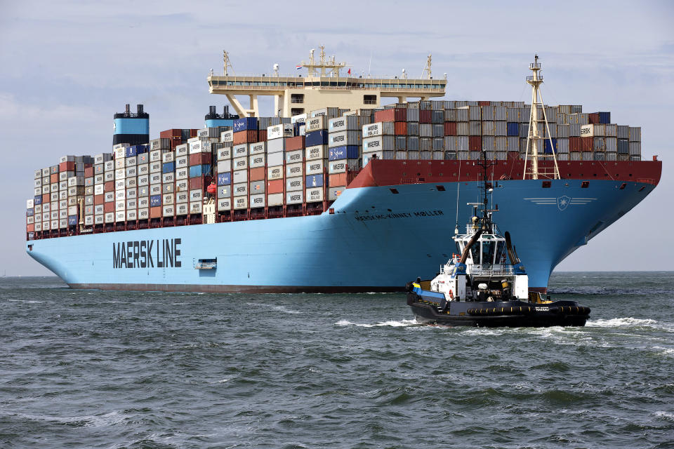 The MV Maersk Mc-Kinney Moller, the world's biggest container ship, arrives at the harbour of Rotterdam August 16, 2013. The 55,000 tonne ship, named after the son of the founder of the oil and shipping group A.P. Moller-Maersk, has a length of 400 meters and cost $185 million. A.P. Moller-Maersk raised its annual profit forecast for the business on Friday, helped by tighter cost controls and lower fuel prices. Maersk shares jumped 6 percent to their highest in 1-1/2 years as investors welcomed a near-doubling of second-quarter earnings at container arm Maersk Line, which generates nearly half of group revenue and is helping counter weakness in the company's oil business. REUTERS/Michael Kooren (NETHERLANDS - Tags: MARITIME TRANSPORT BUSINESS)