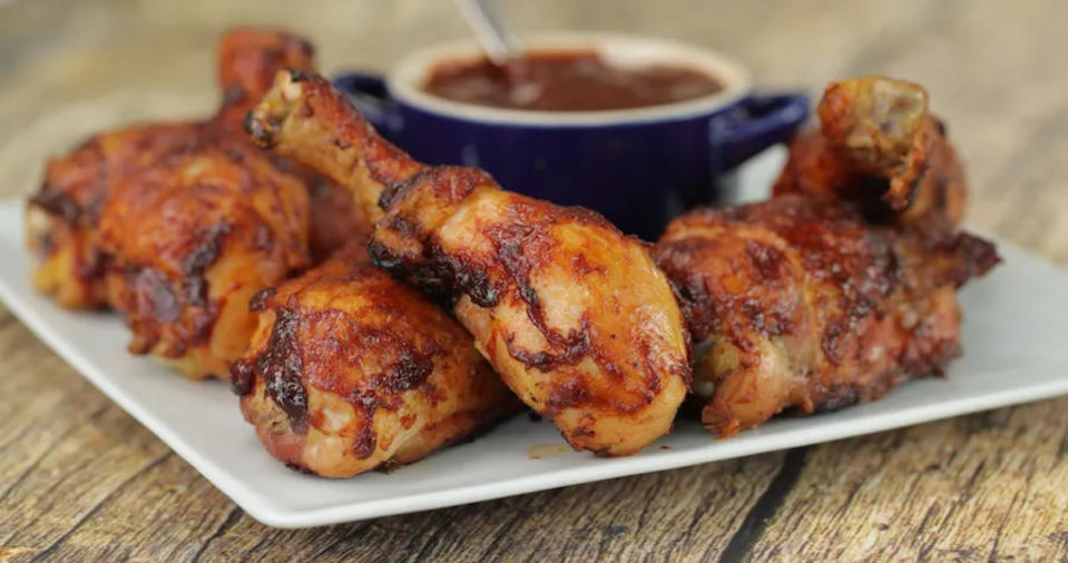 <p>Parade</p><p>There's nothing better than juicy, tangy, smoky barbecued chicken—especially at summer cookouts! <strong>Get the recipe: <a href="https://parade.com/1391573/parade/bbq-chicken-recipe/" rel="nofollow noopener" target="_blank" data-ylk="slk:Juicy BBQ Chicken;elm:context_link;itc:0;sec:content-canvas" class="link ">Juicy BBQ Chicken</a></strong></p>