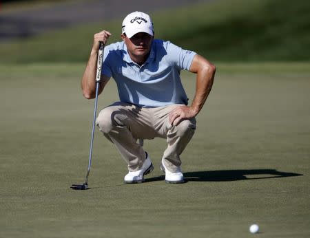 Mar 18, 2017; Orlando, FL, USA; Kevin Kisner lines up a putt on the 16th green during the third round of the Arnold Palmer Invitational golf tournament at Bay Hill Club & Lodge . Mandatory Credit: Reinhold Matay-USA TODAY Sports