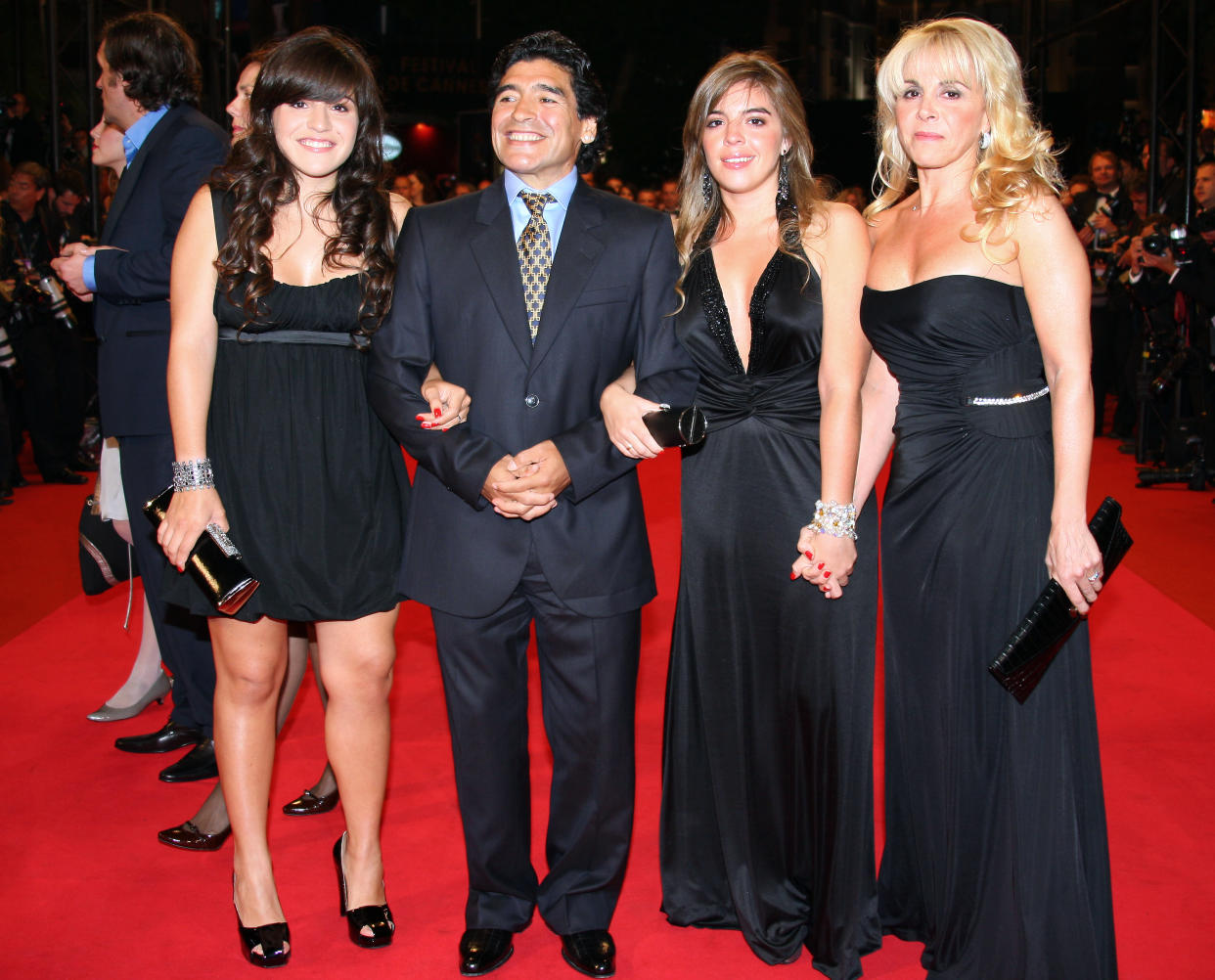 Former Argentinian football player Diego Maradona (C) poses with his wife Claudia (R) and daughters Giannina (L) and Dalma (R) as he arrives to attend the screening of Serbian director Emir Kusturica's documentary film 'Maradona by Kusturica' at the 61st Cannes International Film Festival on May 20, 2008 in Cannes, southern France. The May 14-25 festival winds up with the awards ceremony for the prestigious Palme d'Or, to be determined by a jury headed by Hollywood "bad boy" Sean Penn.    AFP PHOTO / Valery Hache (Photo by Valery HACHE / AFP) (Photo by VALERY HACHE/AFP via Getty Images)